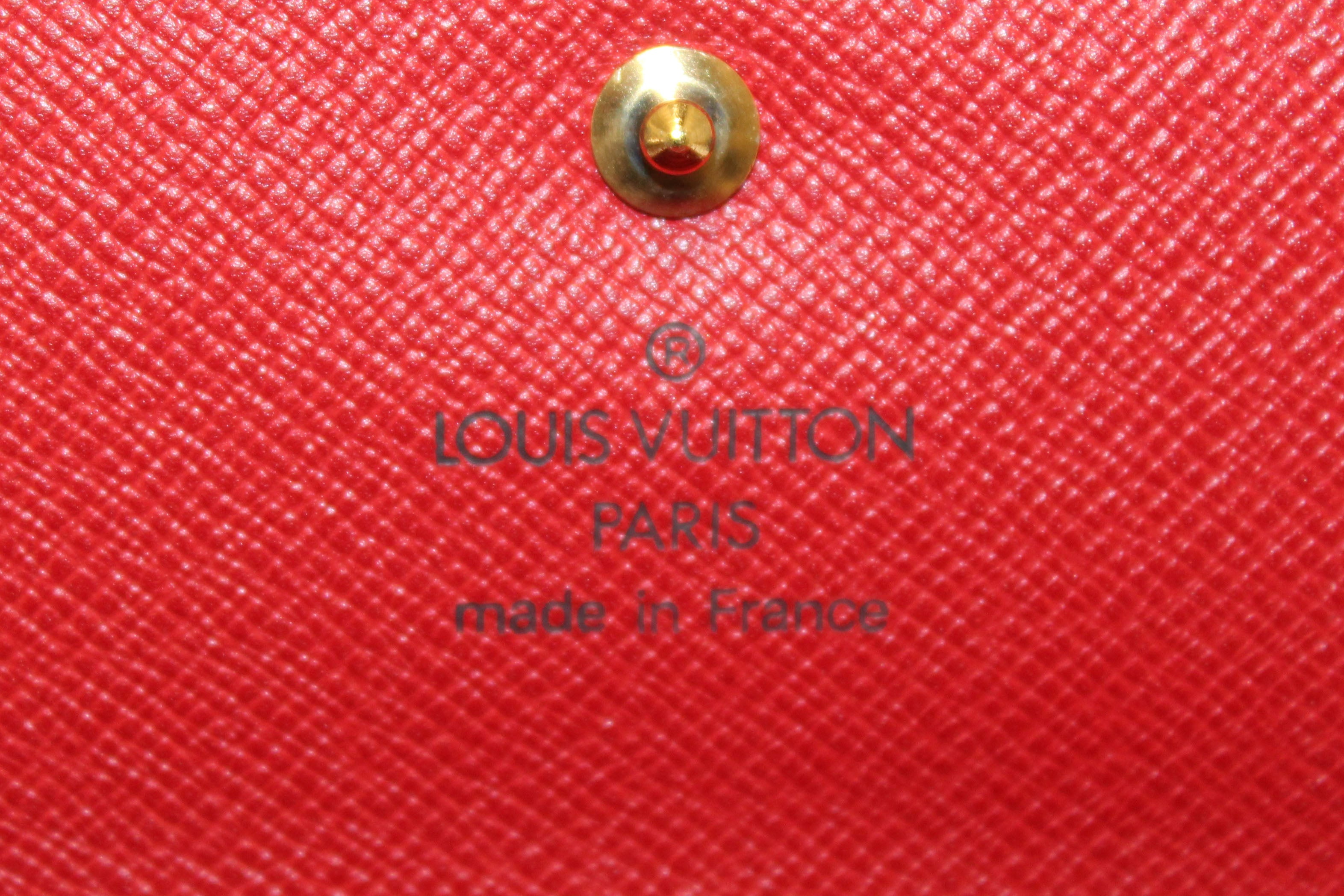 Authentic LOUIS VUITTON women`s monogram leather button wallet