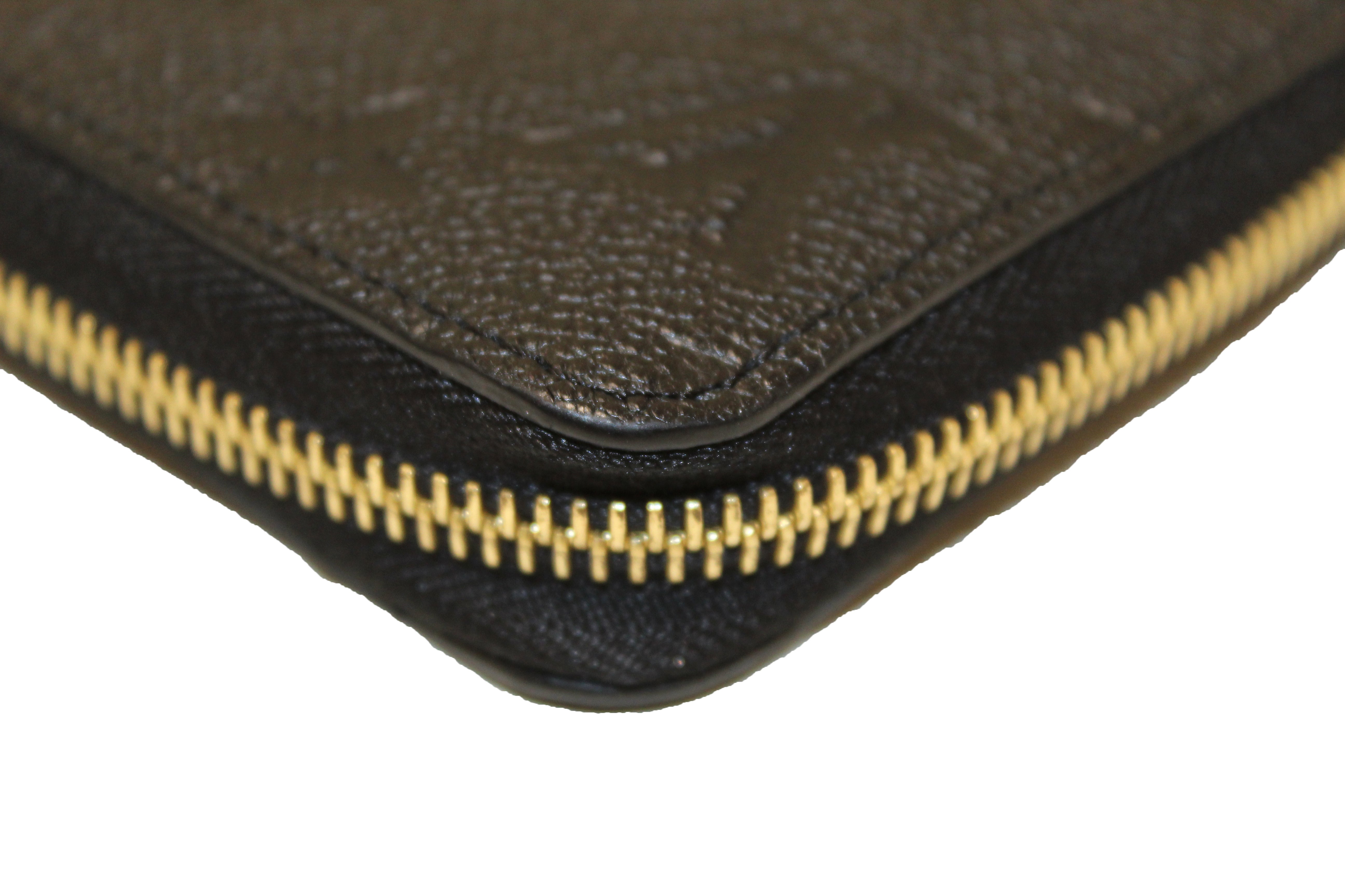 Authentic Louis Vuitton Black Monogram Empreinte Leather Zippy Wallet