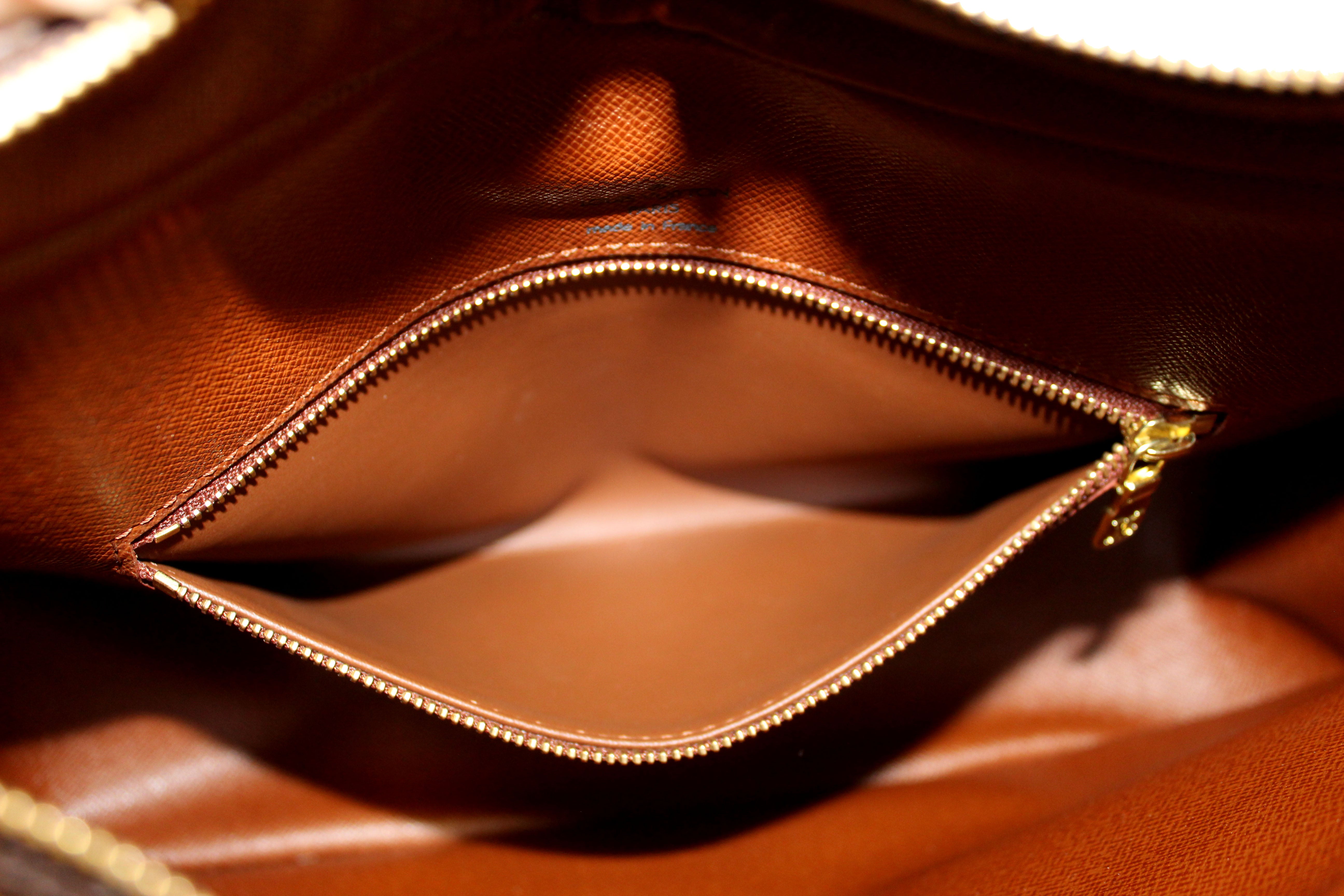 Louis Vuitton Vintage Monogram Courcelles - Brown Shoulder Bags