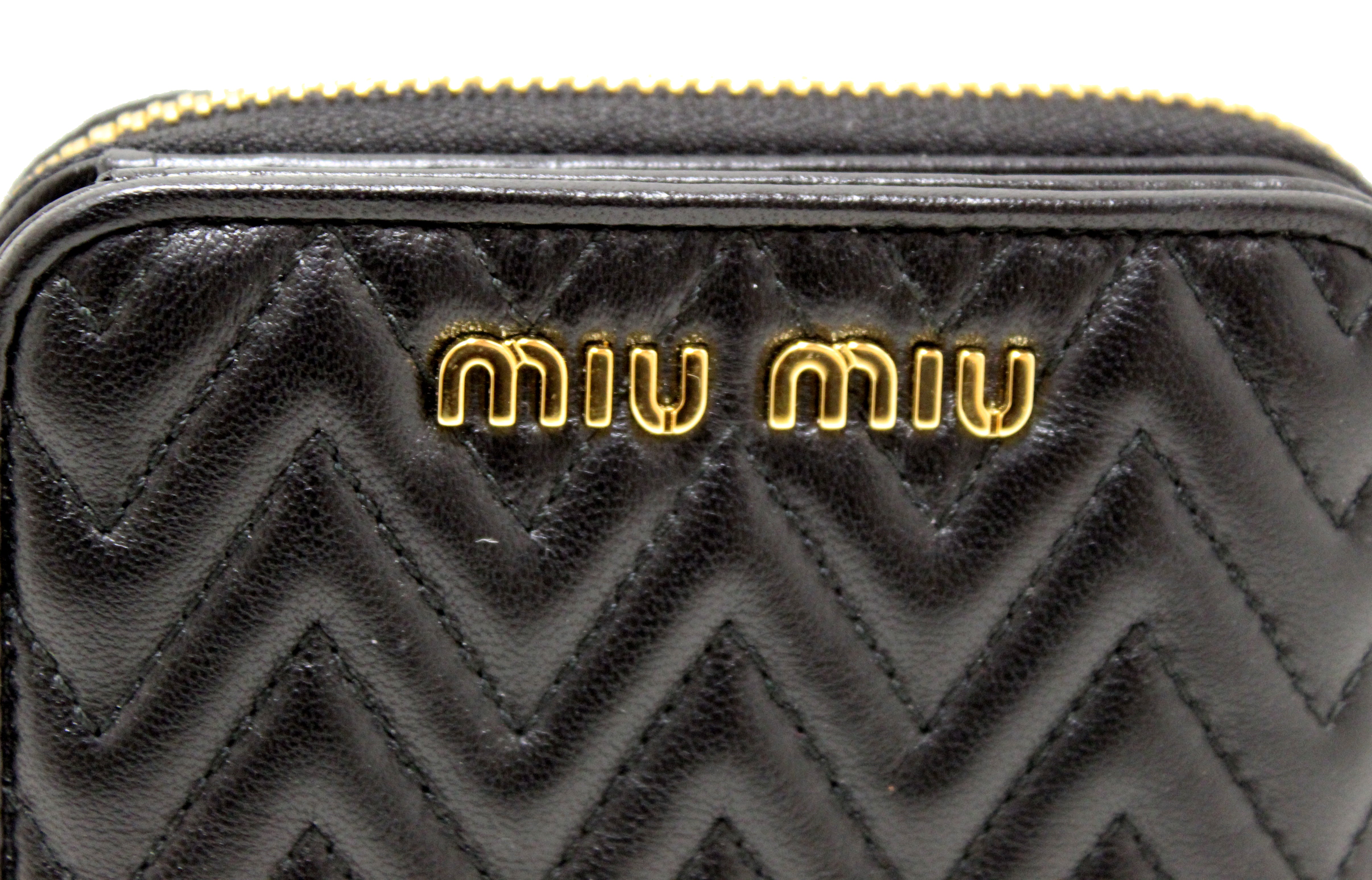 Authentic Miu Miu Black Nappa Lampo Leather Small Bi-Fold Wallet