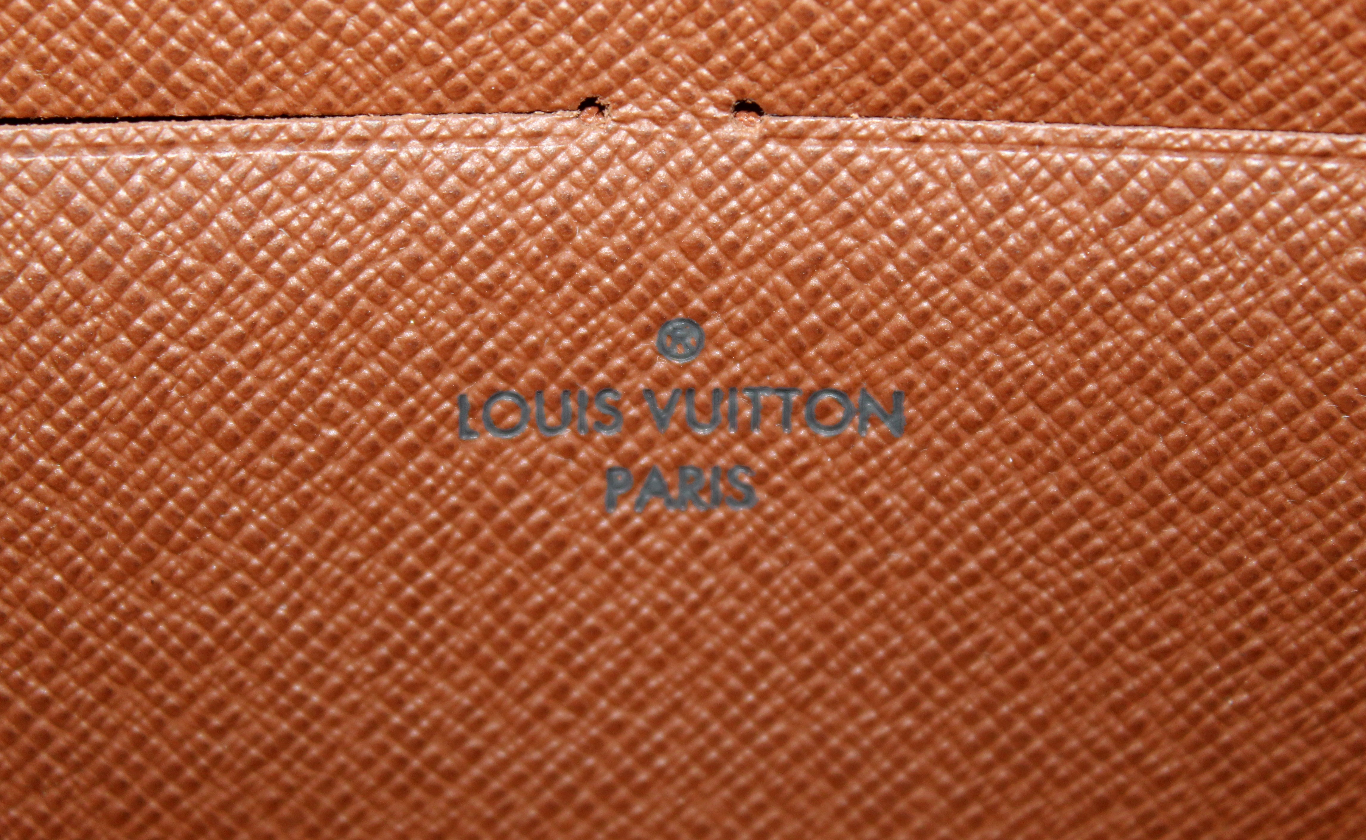 Authentic Louis Vuitton Classic Monogram Canvas Zippy Wallet