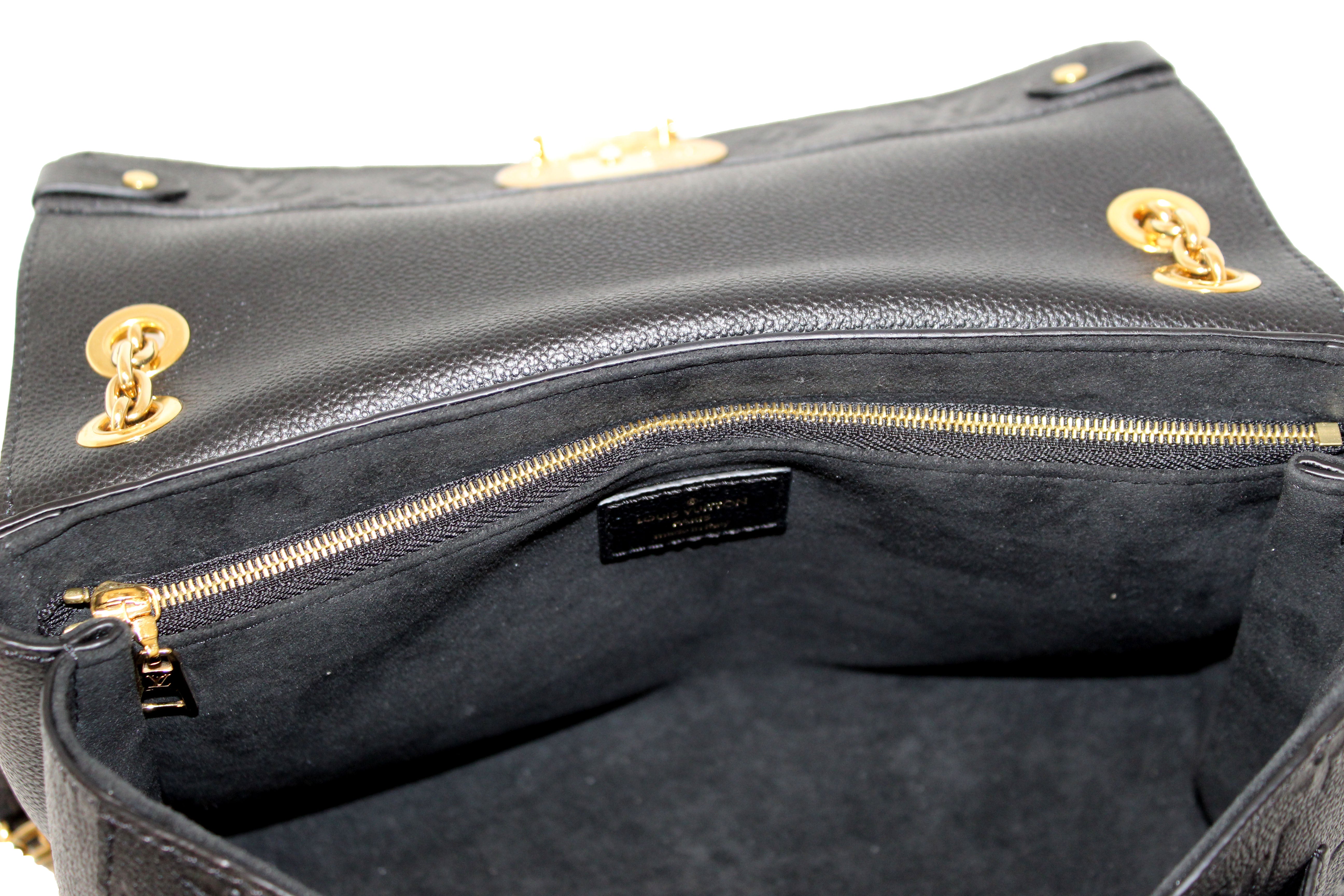 Authentic Louis Vuitton Black Monogram Empreinte Leather Vavin PM Shoulder Bag