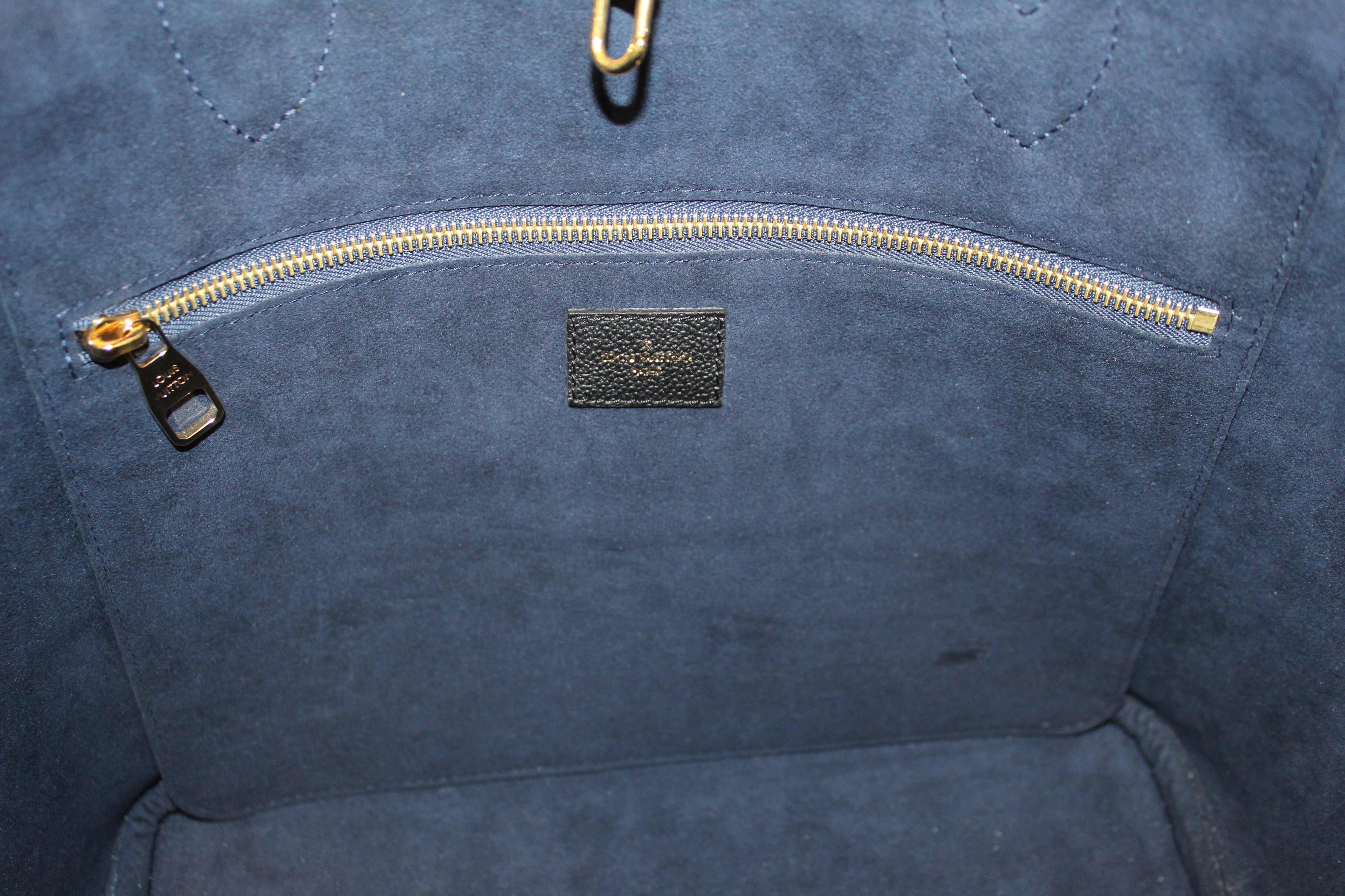 Authentic Louis Vuitton Black Monogram Empreinte Leather Neverfull MM –  Paris Station Shop