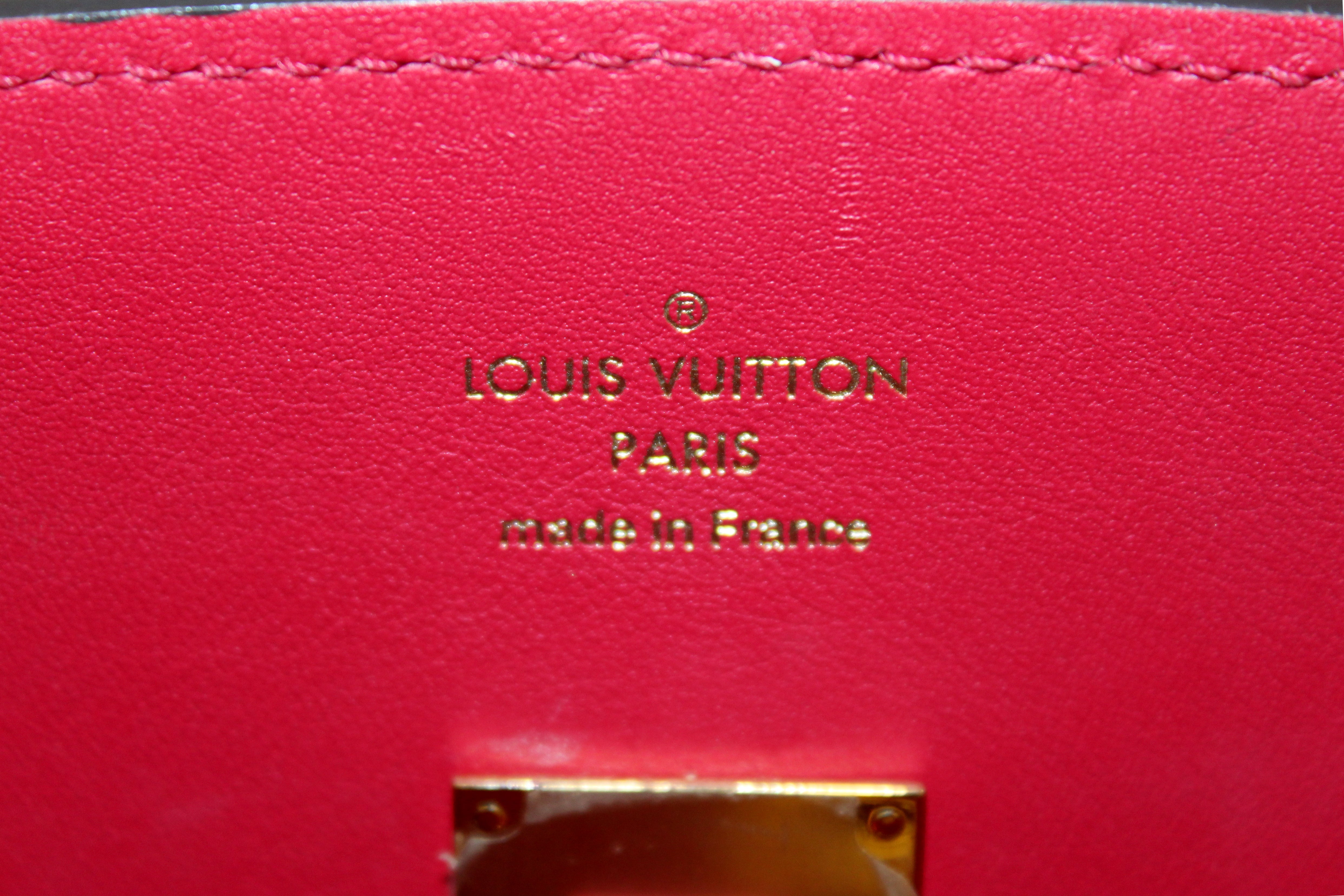Authenticated Louis Vuitton Veau Nuage Milla PM Red Calf Leather