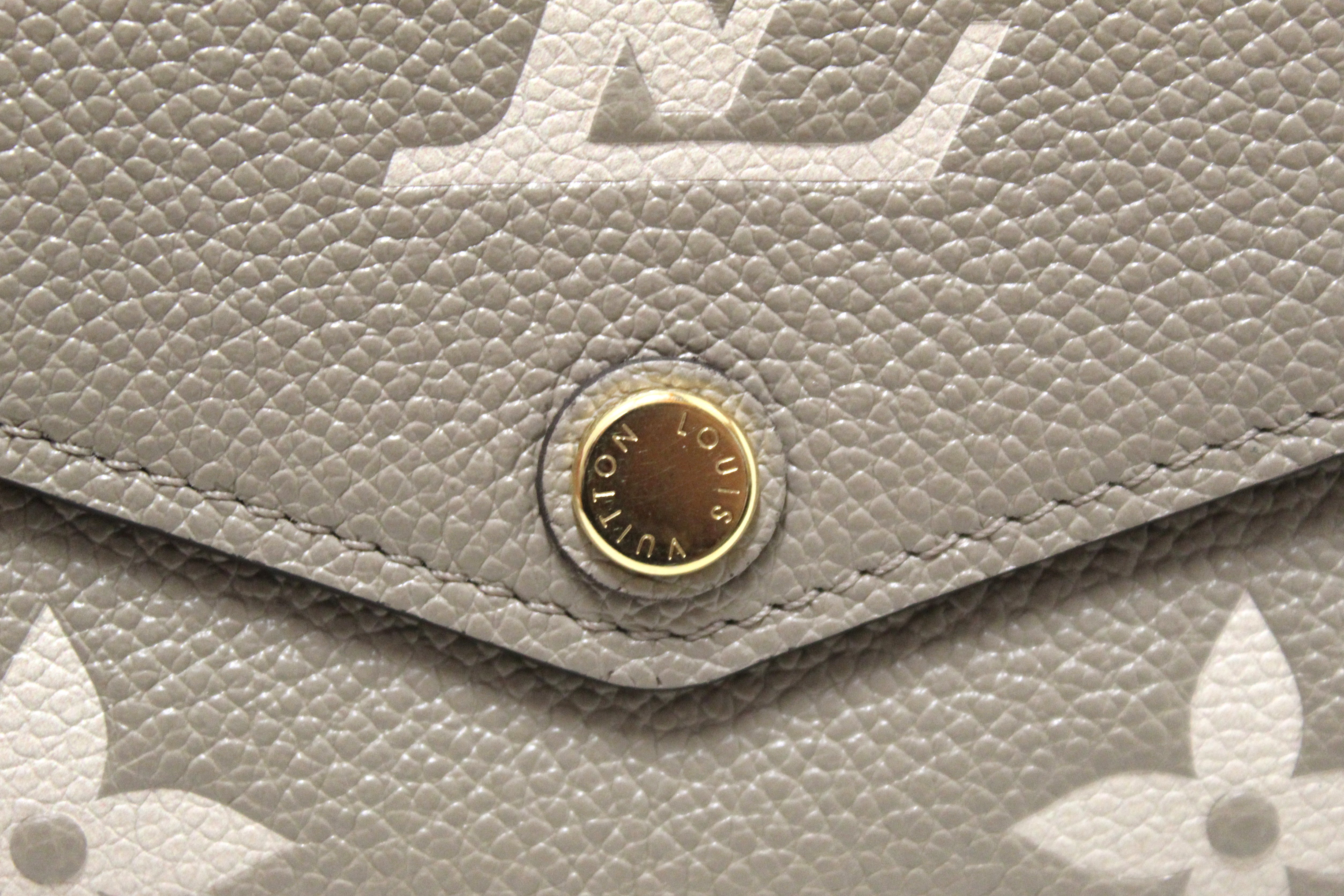Louis Vuitton Cream Monogram Empreinte Leather Sarah Wallet Louis Vuitton