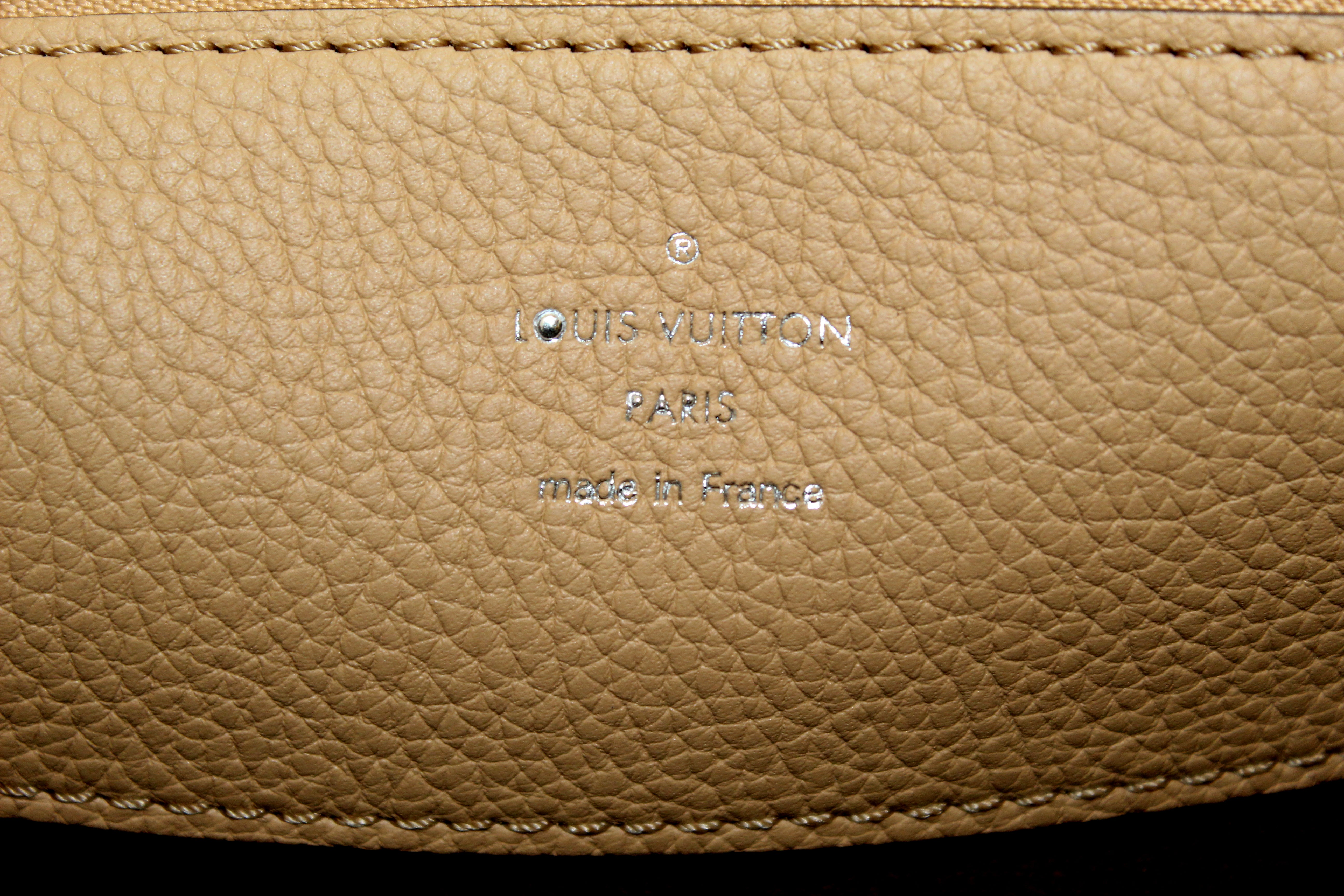 Louis Vuitton Crème Beige and Brown Mahina Perforated Calfskin Leather – I  MISS YOU VINTAGE