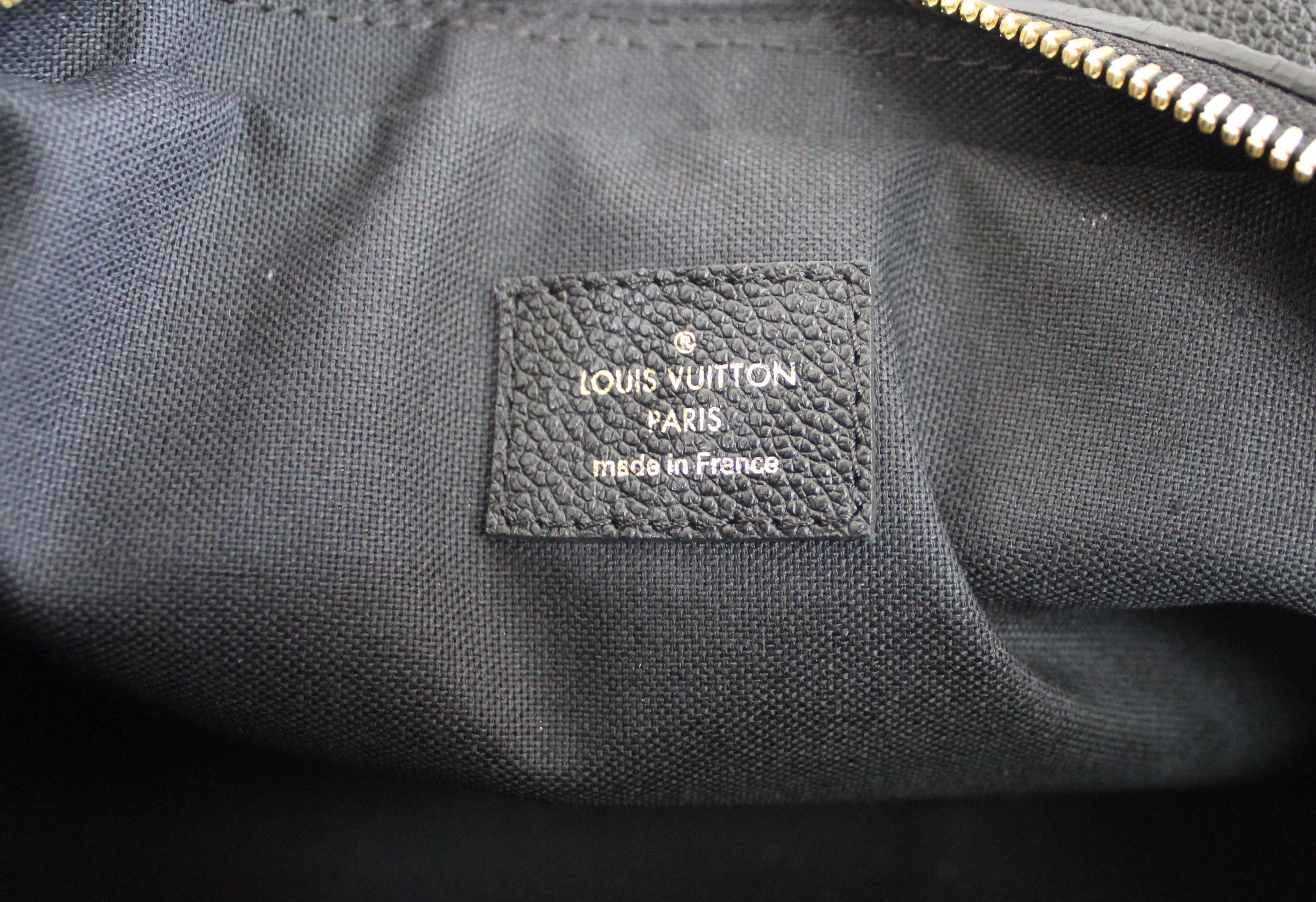 Authentic Louis Vuitton Black Empreinte Leather Vosges MM Handbag