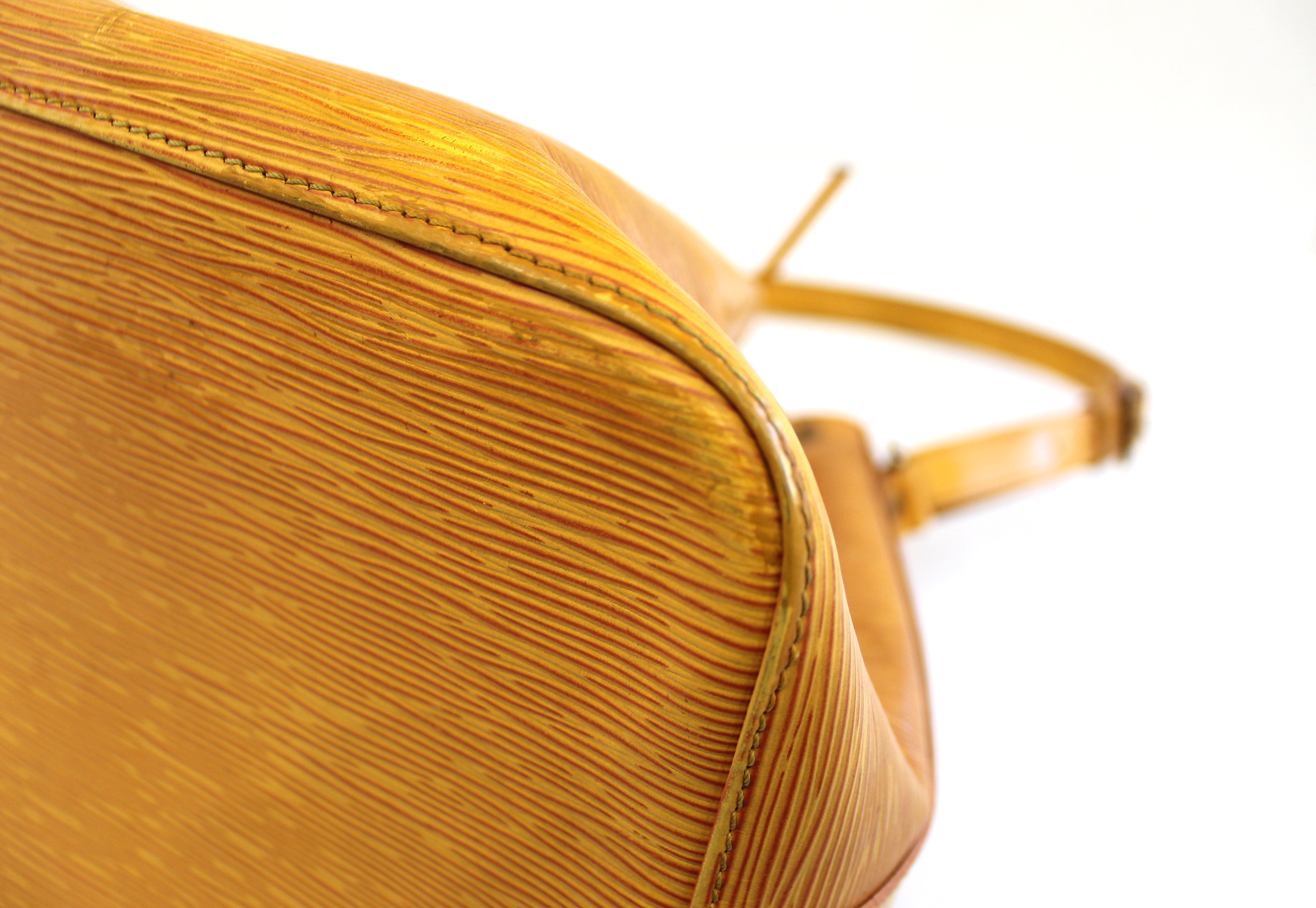 Authentic Louis Vuitton Epi yellow leather Petit Noe bag