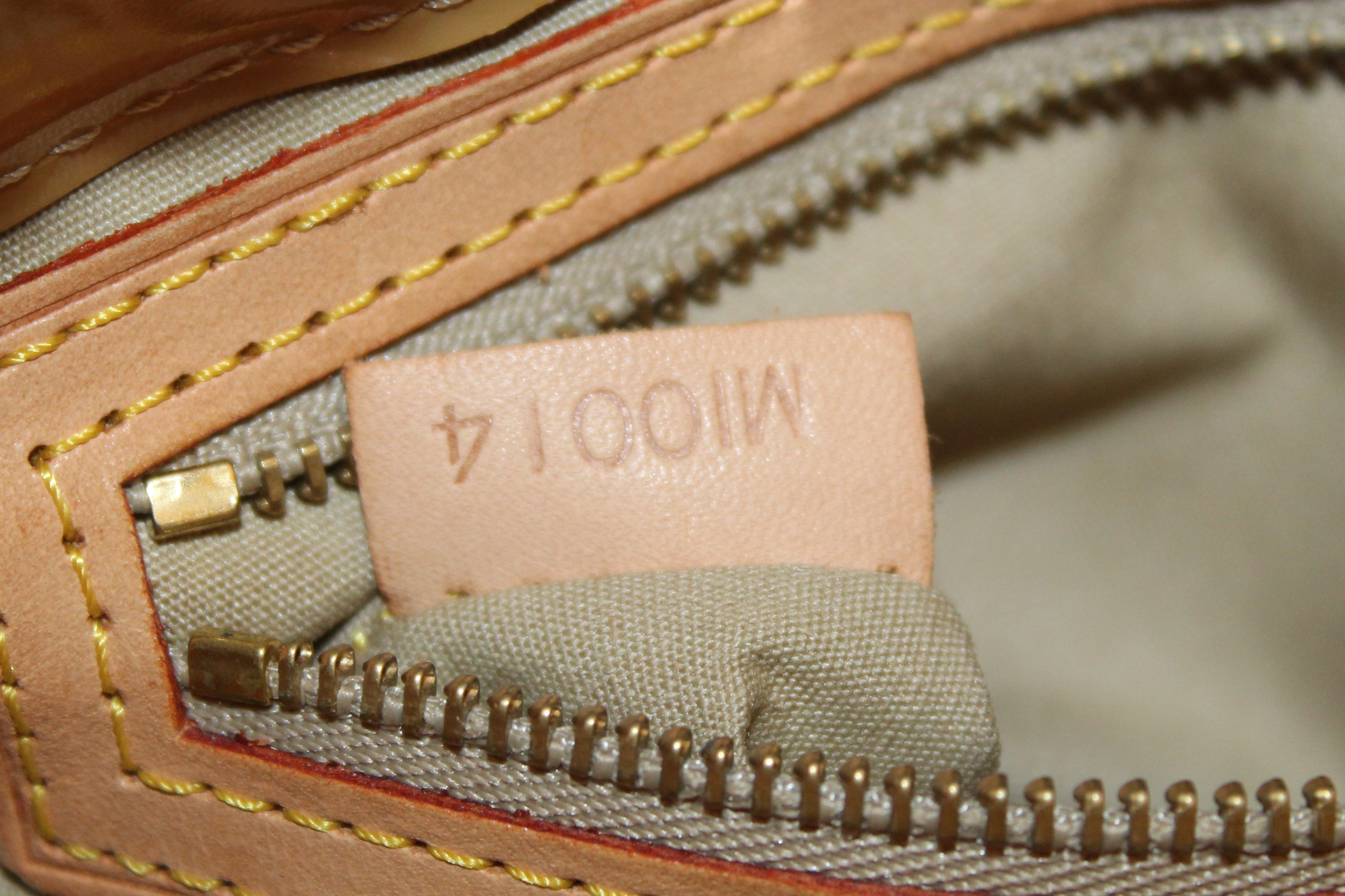 Authentic Louis Vuitton Beige Monogram Vernis Patent Leather Reade
