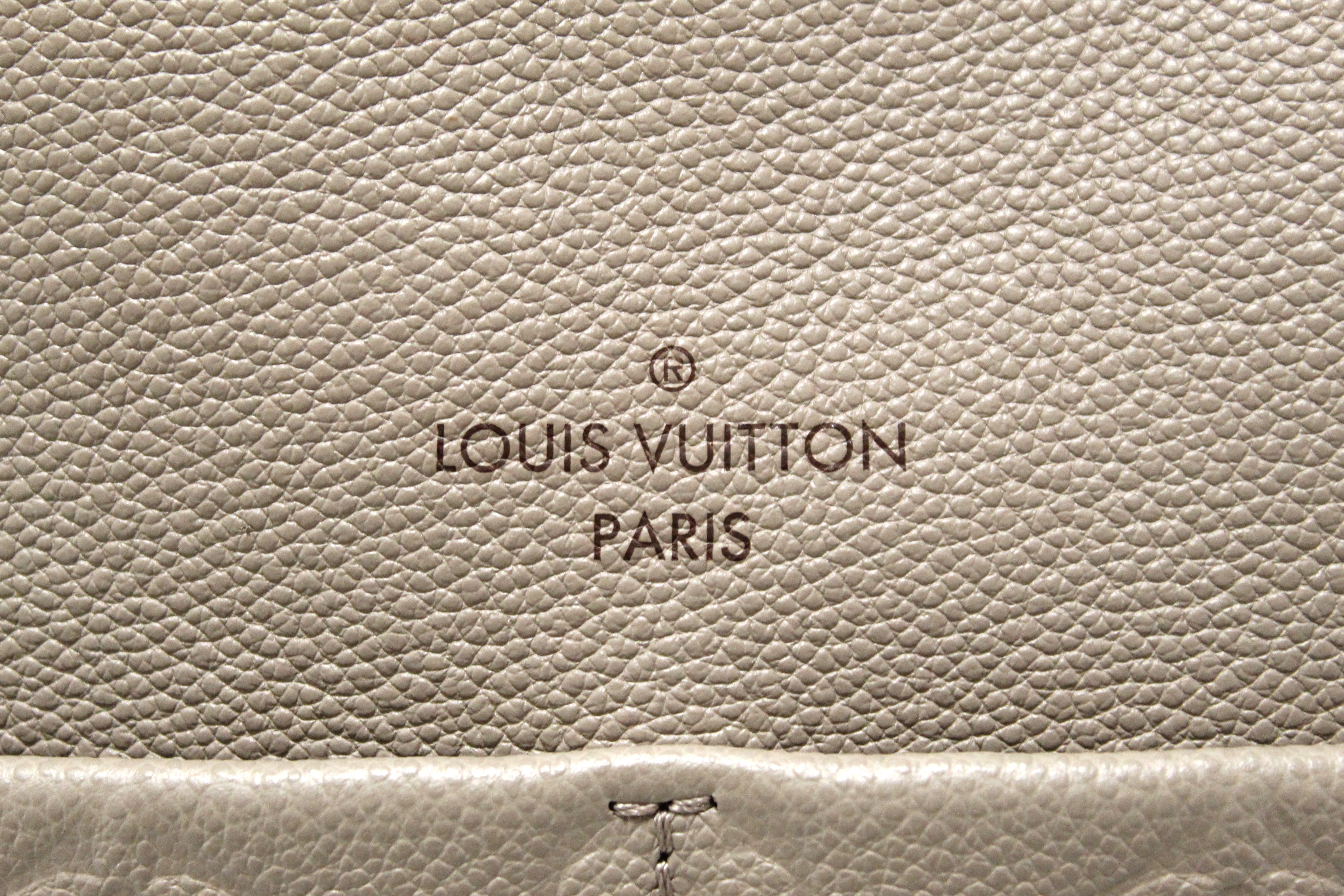 Authentic Louis Vuitton Turtledove Monogram Empreinte Leather Maida Ho –  Paris Station Shop