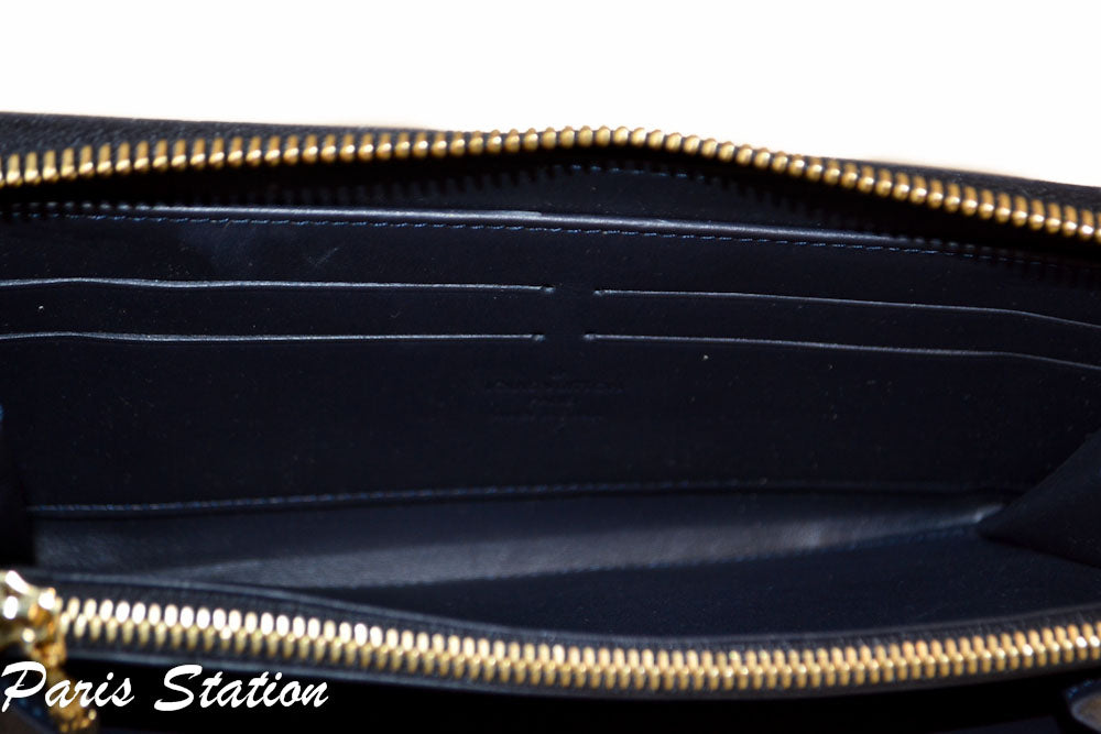 Authentic Limited Edition Louis Vuitton Teal & Beige Vernis Leopard Zippy Wallet